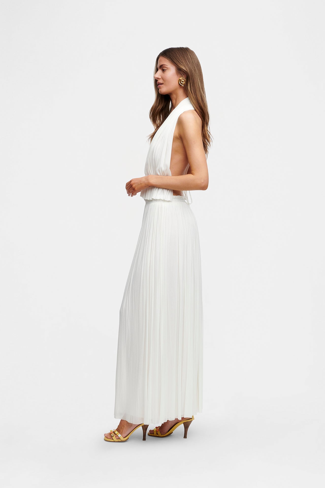 silk and tulle dress Draped sheer in gold foiled tulle, built in gloves, a floor sweeping scarf in bra cups and vertical boning Adjustable tulle spaghetti straps Back zipper Slit on the left front of the skirt Full JEWEL Wedding Dress | Glitter