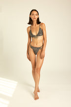 Bikini two piece for summer beach & vacation worn by beautiful stylish women.
