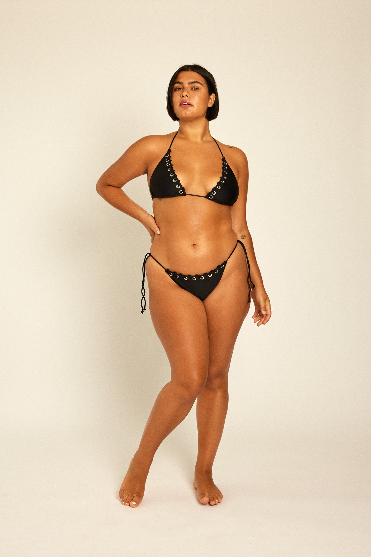 Curvy model in plus size XL Bikini two piece for summer beach.