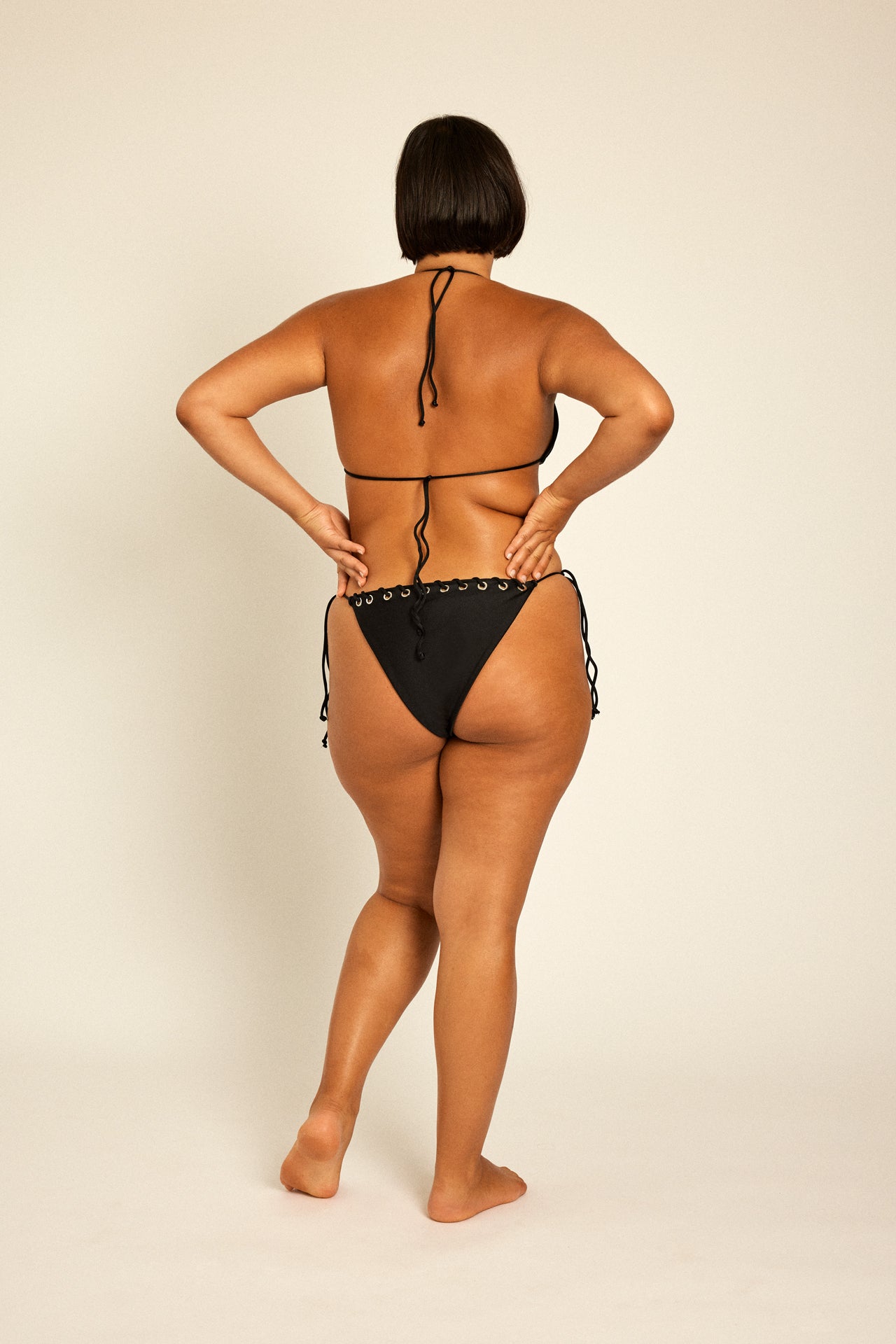 Great flattering fit Bikini two piece worn as top by plus size XL beautiful curvy model.