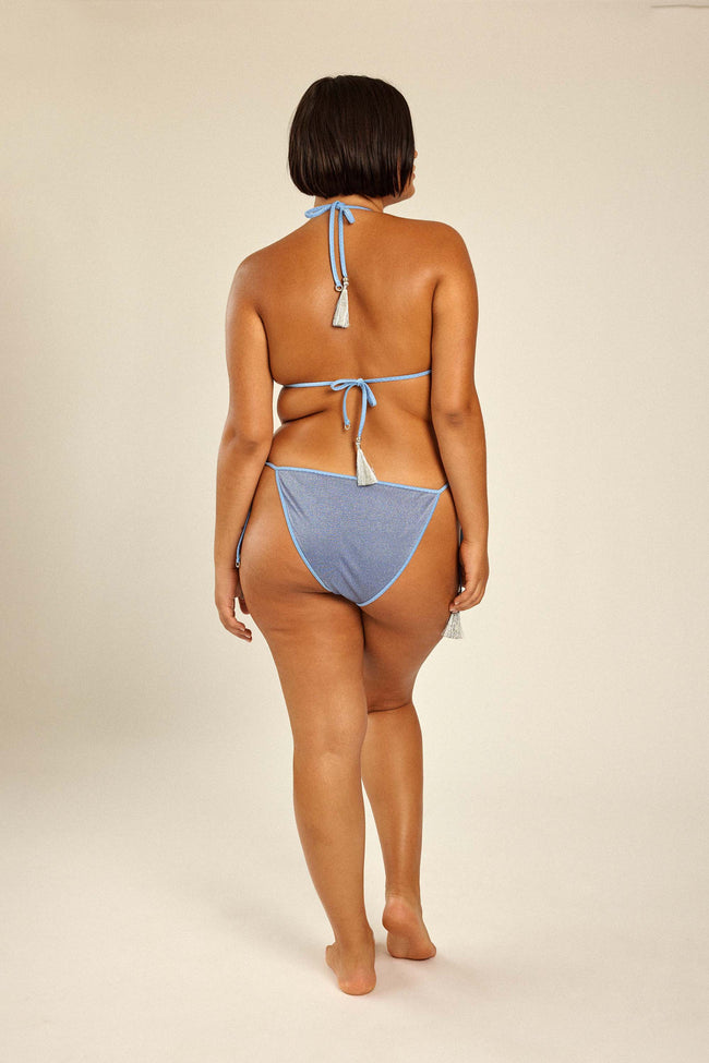 Curvy model in plus size XL Bikini for summer beach.