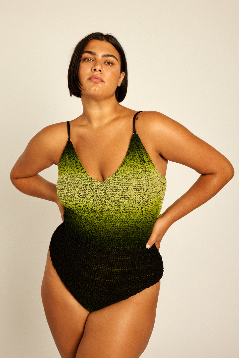 Great flattering fit silk swimsuit worn as top by plus size XL beautiful curvy model.