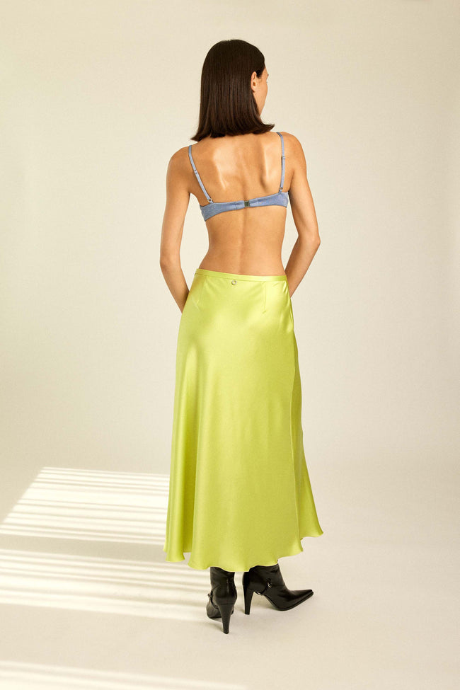 Beautiful woman in Colorful Satin Skirt for resort, party & wedding.