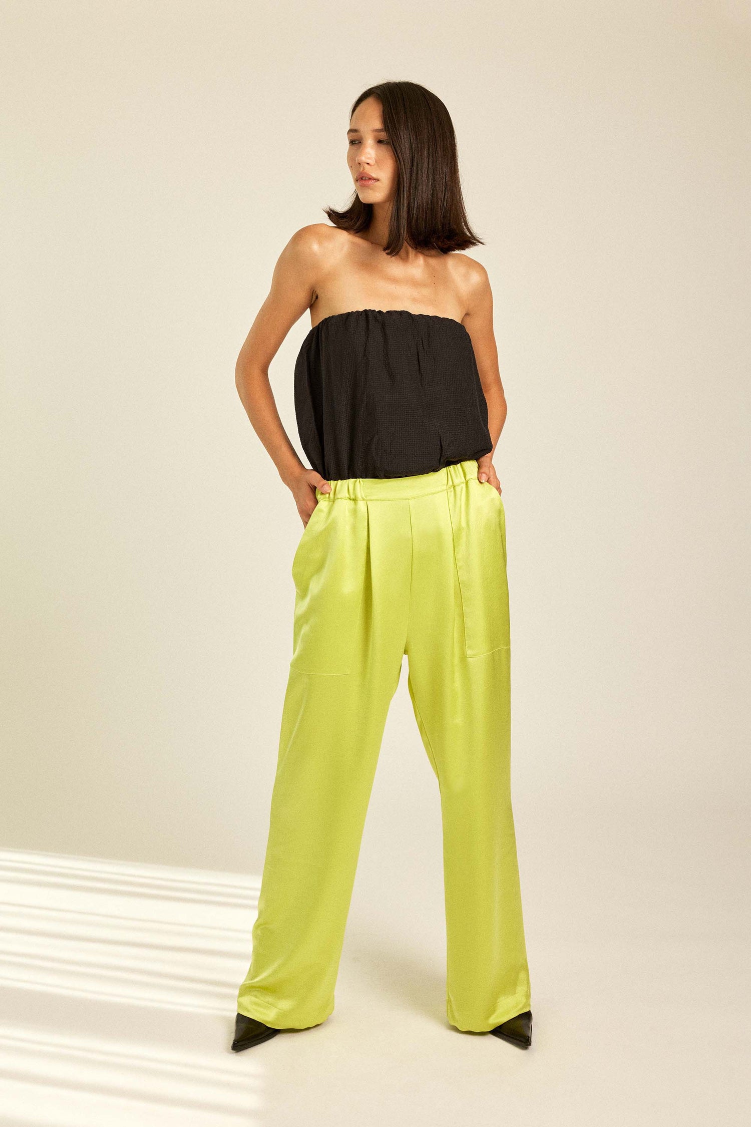 Designer Colorful Satin Trousers worn by stylish women like you. Perfect for resort, party & wedding.