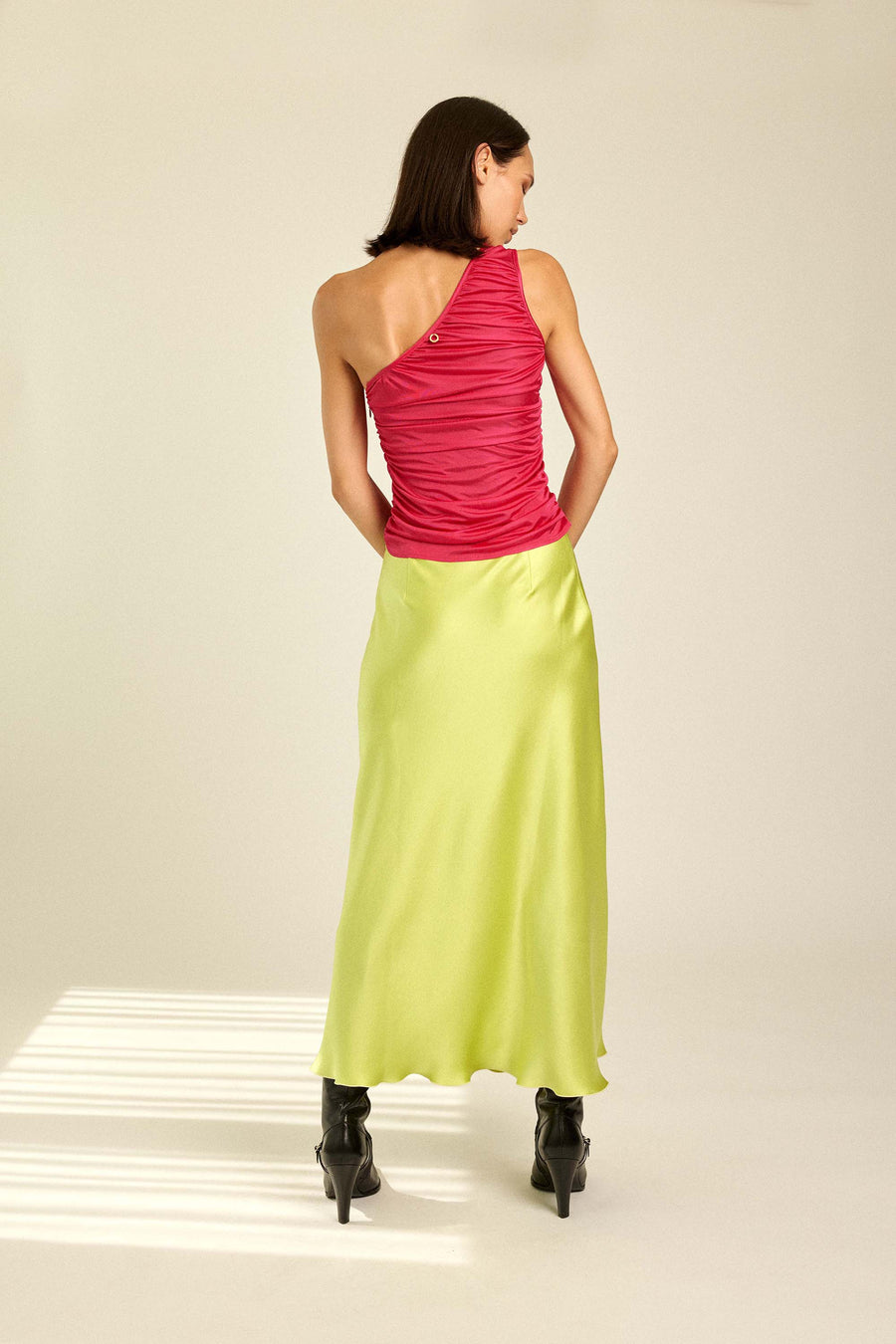 Woman in Top & Satin Skirt for resort, party & wedding.